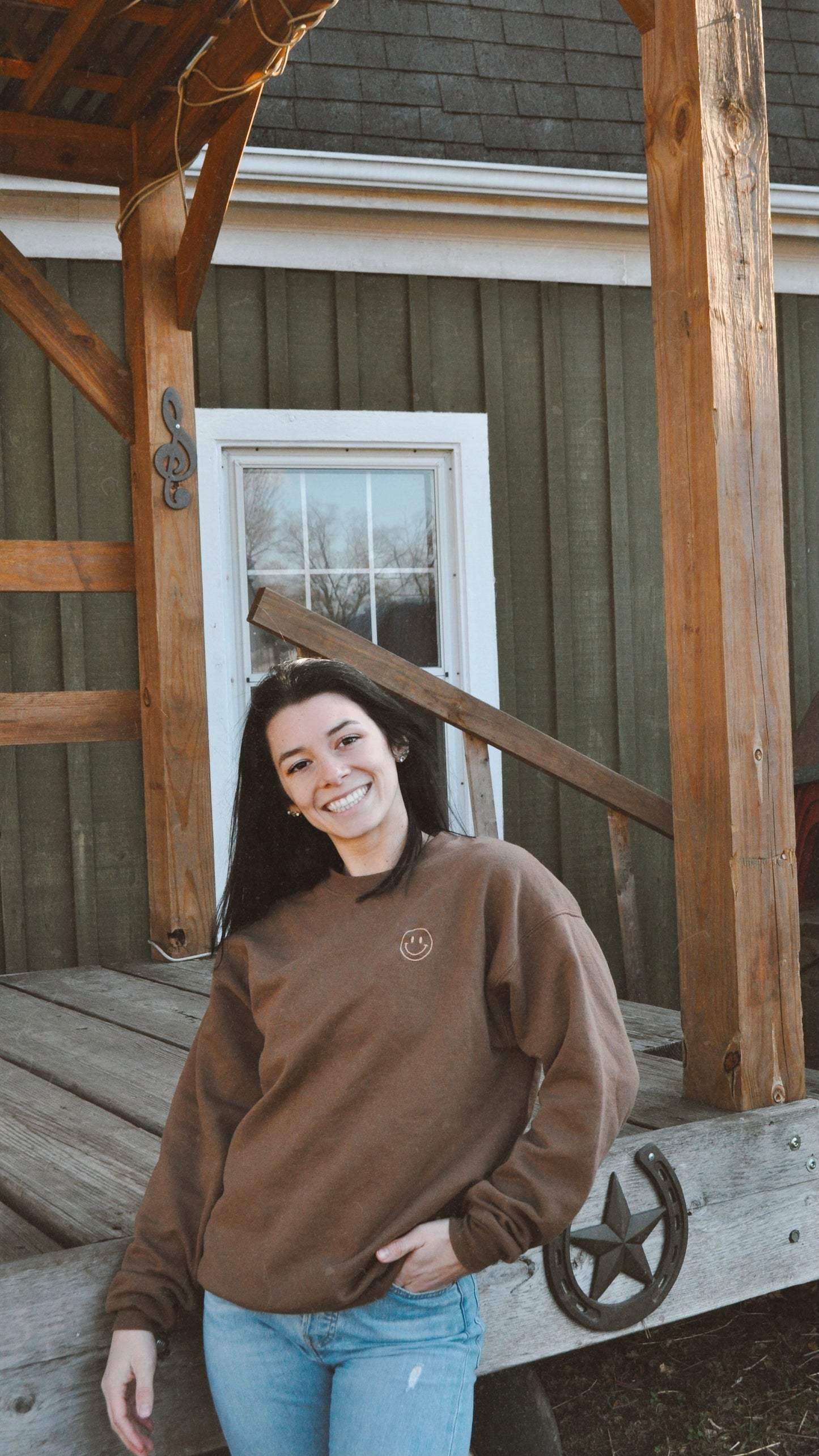 Sudadera con cara sonriente
